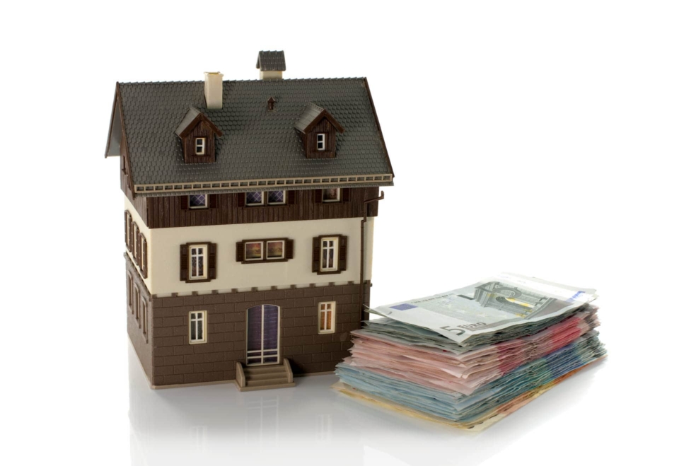 Bild von einem Haus mit Geld